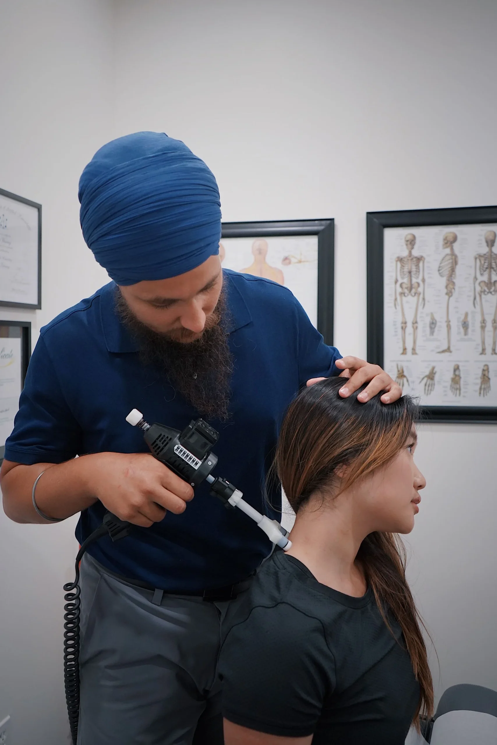 Practitioner providing neck care in a clinical setting